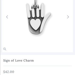 Sterling silver James Avery charm.